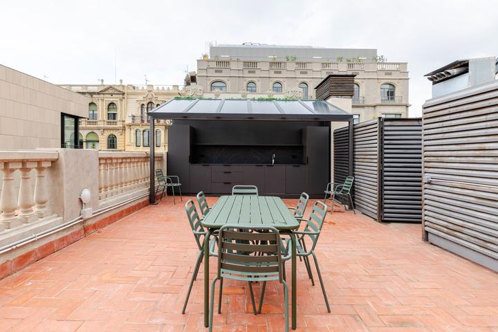Terraza con cocina exterior